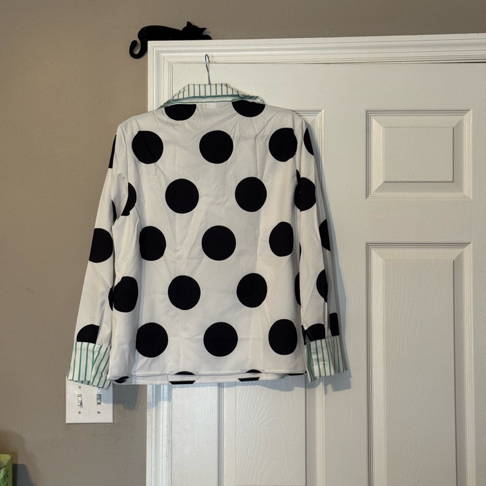 Never worn women’s polyester shirt M with green and white striped ruffle. Cute!!